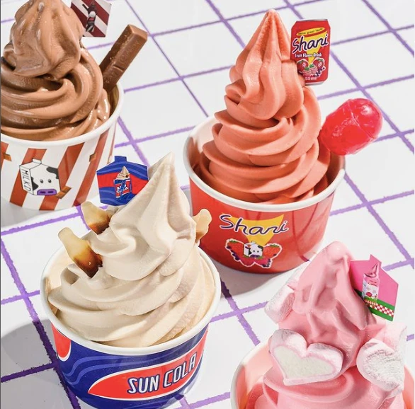 For those seeking a proper nostalgic blast from the past, Milkd offers soft serves inspired by iconic fizzy drinks of the 90s, including Sun Cola and Shani, fruit juices like Tang and Vimto, and KDD chocolate and strawberry milk flavors. (Instagram:@milkd.jeddah)