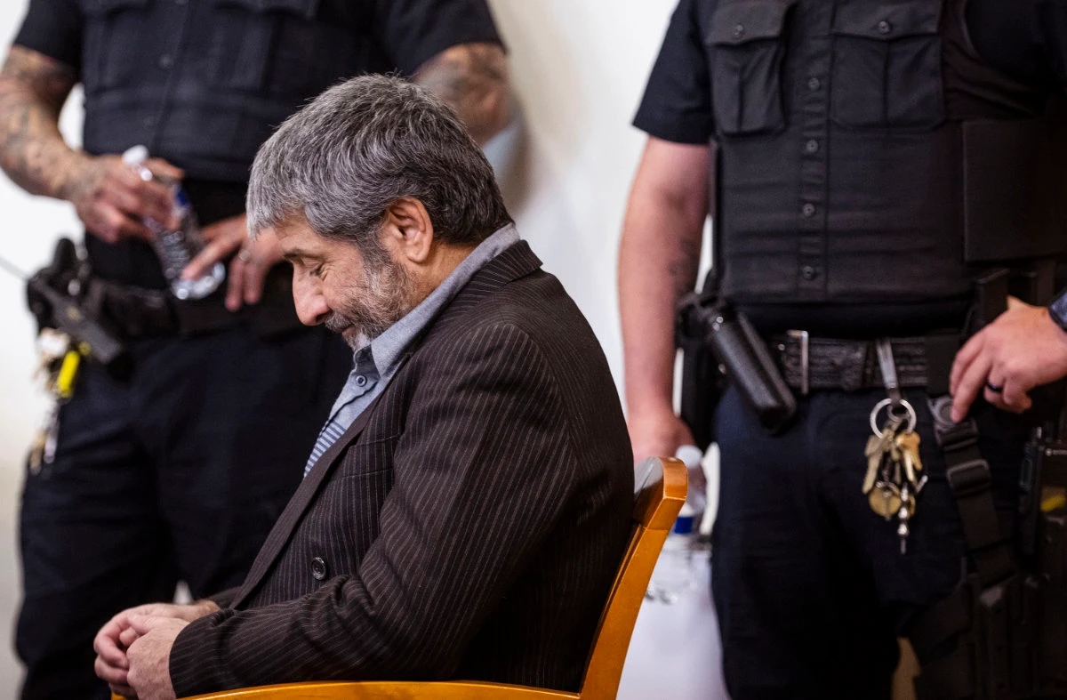 Muhammad Syed takes his seat before opening statements at the Bernalillo County Courthouse in Downtown Albuquerque, New Mexico, on March 12, 2024. (The Albuquerque Journal via AP/File)