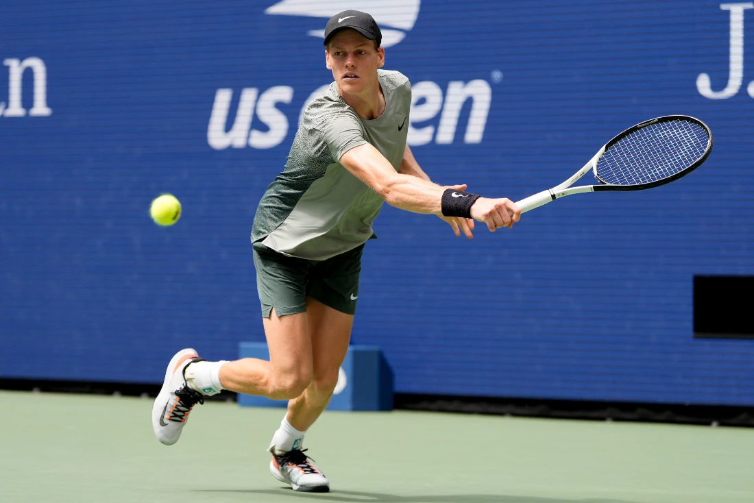 Jannik Sinner, of Italy, returns a shot to Alex Michelsen, of the US, during the second round of the US Open tennis championships in New York. (AP)