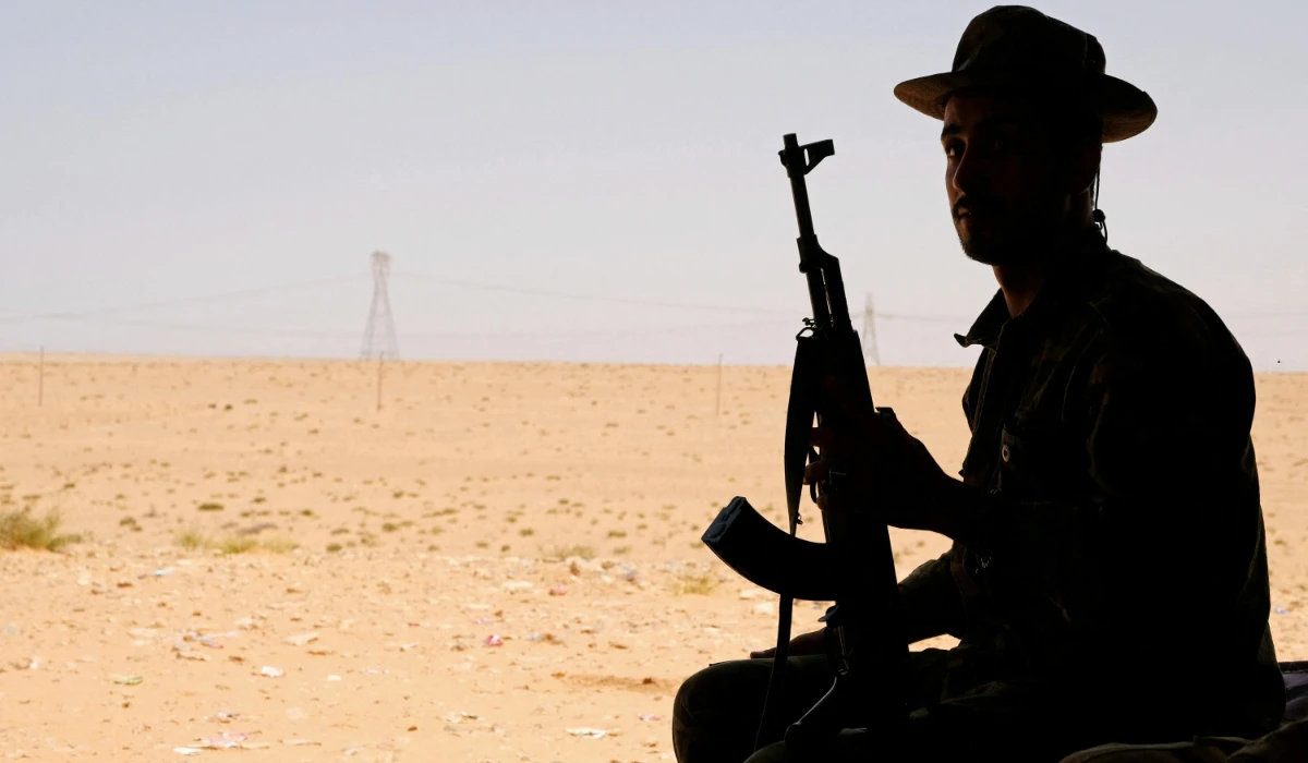 A member of the Libyan National Army (LNA) commanded by Khalifa Haftar sits in a tent at one of their sites in west of Sirte, Libya August 19, 2020. (REUTERS)