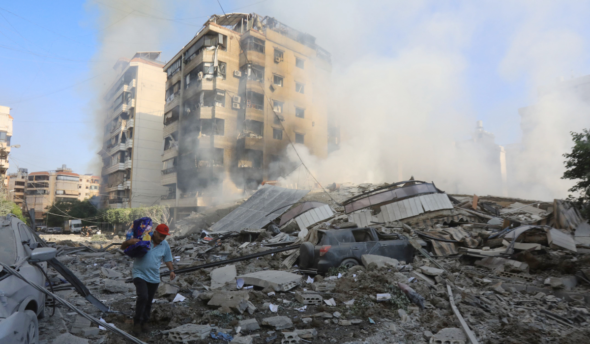 A man walks through the rubble in the aftermath of Israeli airstrikes in Beirut. (AFP)