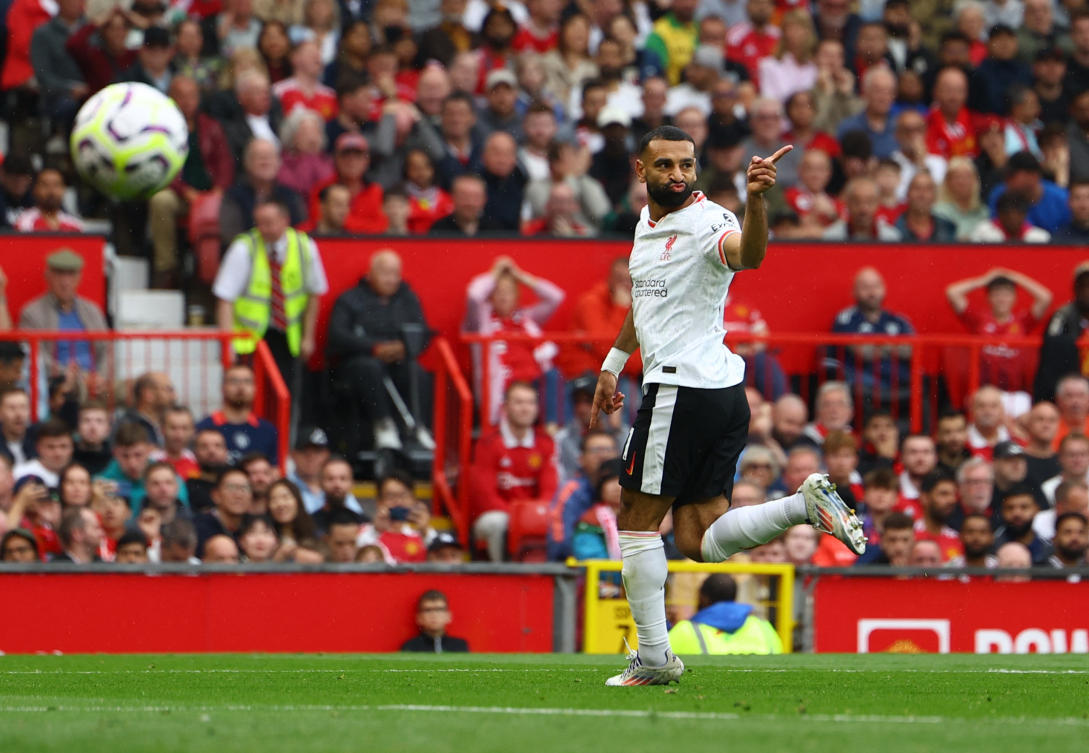 Liverpool’s Mohamed Salah celebrates scoring their third goal against Manchester United at Old Trafford in the Premier League. (Reuters)