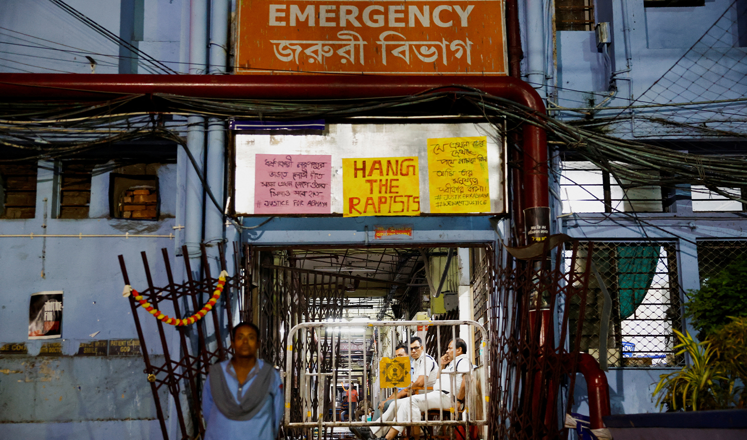 Security officials are seen inside and outside the medical emergency ward that was vandalised by an unidentified mob on August 15, inside the premises of R. G. Kar Medical College and Hospital in Kolkata, India, on August 20, 2024. (REUTERS)