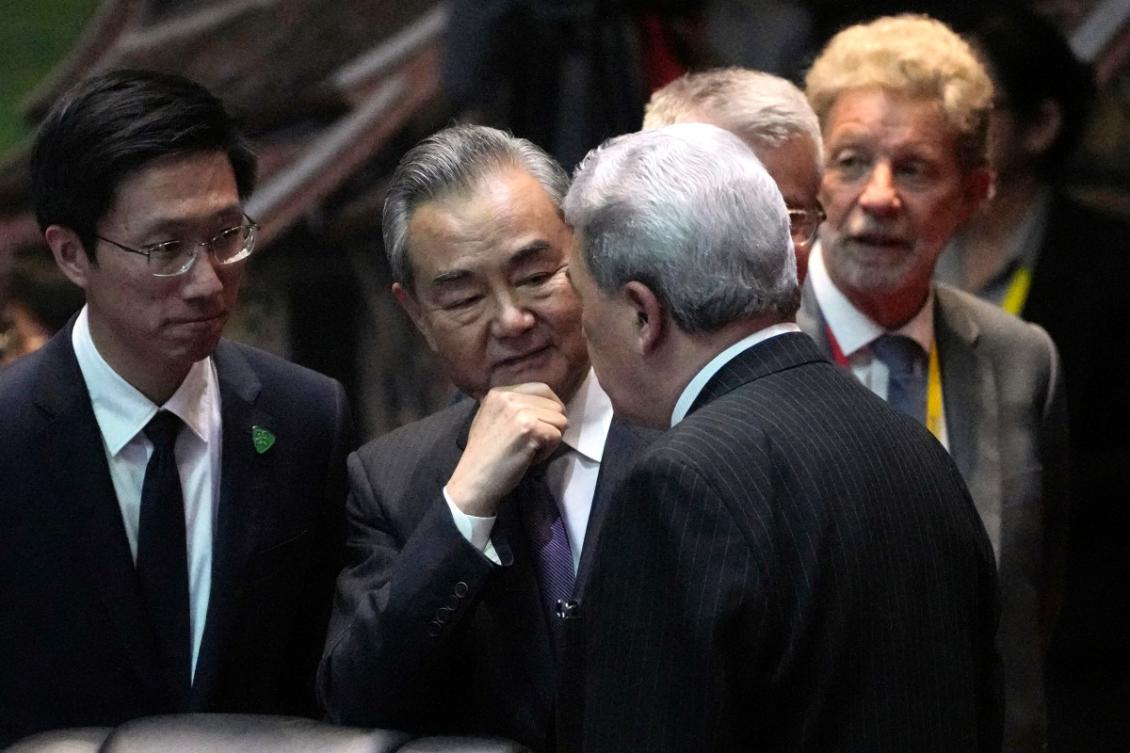 China's Foreign Minister Wang Yi (C) speaks with New Zealand's Foreign Minister Winston Peters (centre R) during the 14th East Asia Summit Foreign Ministers' Meeting at the 57th Association of Southeast Asian Nations (ASEAN) Foreign Ministers' Meeting in Vientiane on July 27, 2024. (File/AFP)