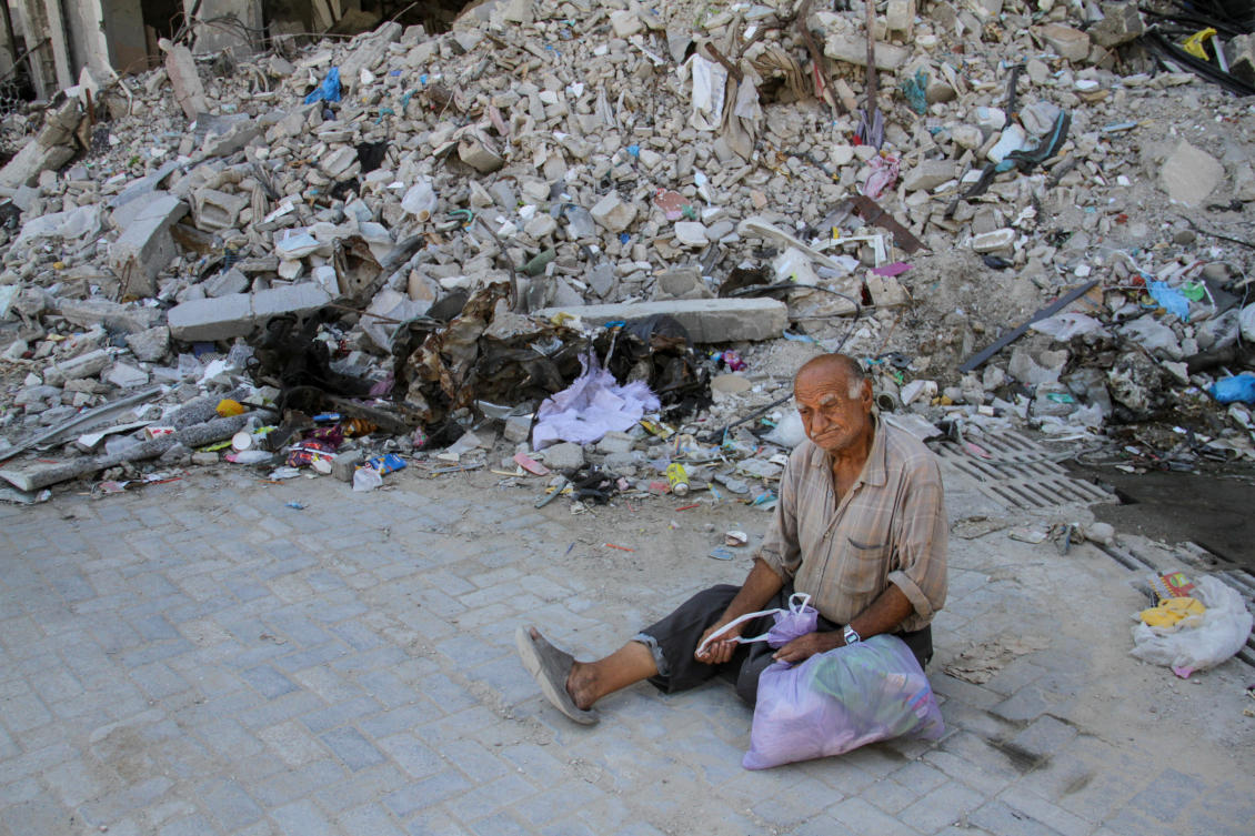 A Palestinian man sits in front of the rubble of a house at the site where a makeshift pastry shop was hit by an Israeli strike a day earlier, amid Israel-Hamas conflict, in Jabalia refugee camp in the northern Gaza Strip September 3, 2024. (Reuters)