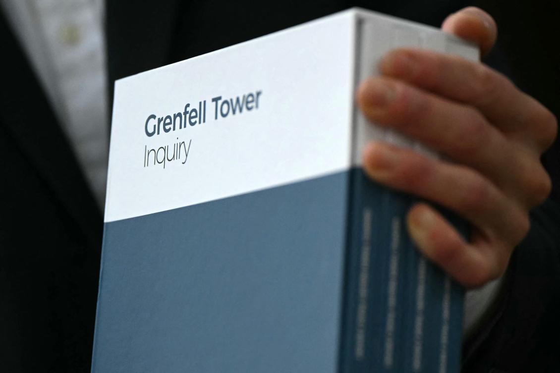 Above, a copy of the Grenfell Tower Inquiry is displayed for members of the media following its publication, in London on Sept. 4, 2024. (AFP)