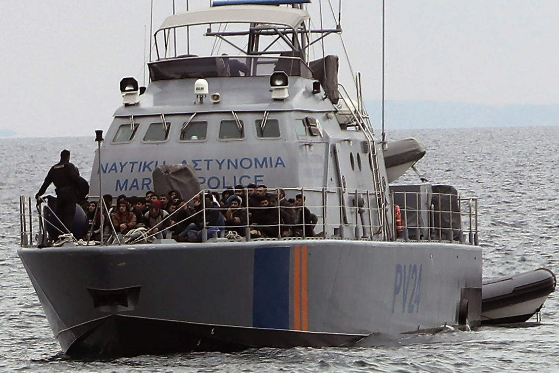 Migrants aboard a Cyprus marine police patrol boat are brought to a harbor after being rescued from their own vessel off the Mediterranean island nation’s southeastern coast of Protaras, Cyprus.(File/AP)