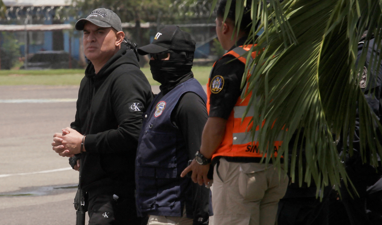 Honduran security forces escort Mario Jose Calix, who was detained on drug trafficking charges and extradited to the US for alleged links to drug trafficking, at a military base in Comayagua, Honduras, September 4, 2024. (Reuters)