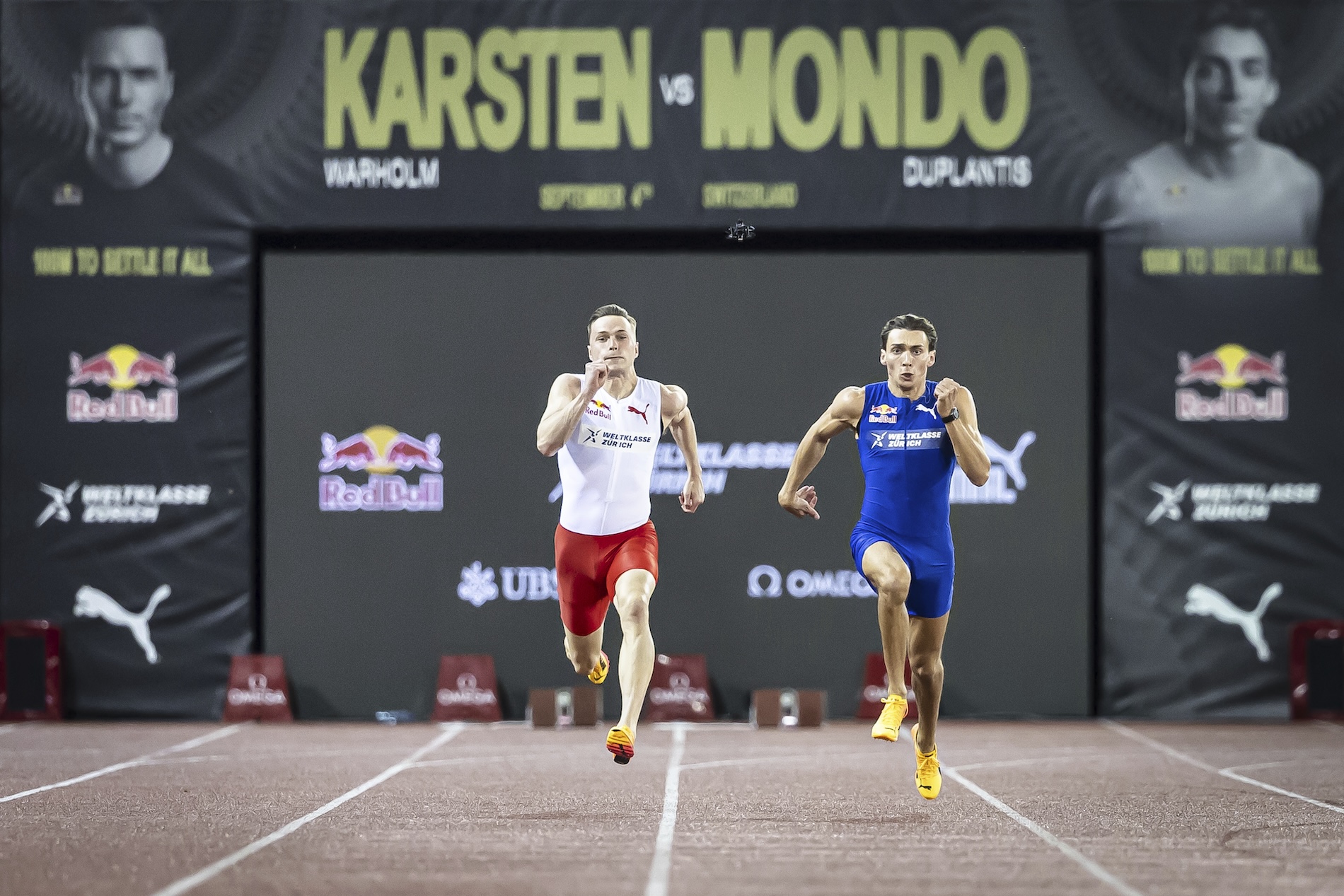 Armand Duplantis, right, of Sweden, races against Karsten Warholm, of Norway, in a 100 meters sprint at the IAAF Diamond League Athletics meet Wednesday in Zurich. (AP)