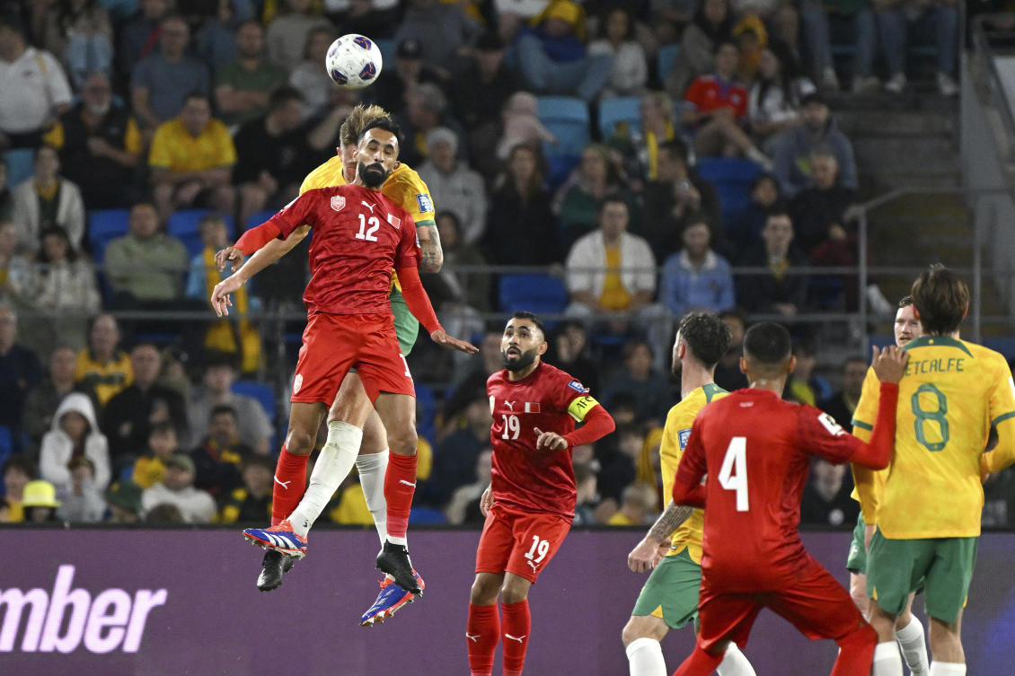 Bahrain’s Mahdi Abduljabbar Mahdi Darwish Hasan competes with Australia’s Harry Souttar during a 2026 World Cup qualifying match, Gold Coast, Australia, Thursday, Sept. 5, 2024. (AP Photo)