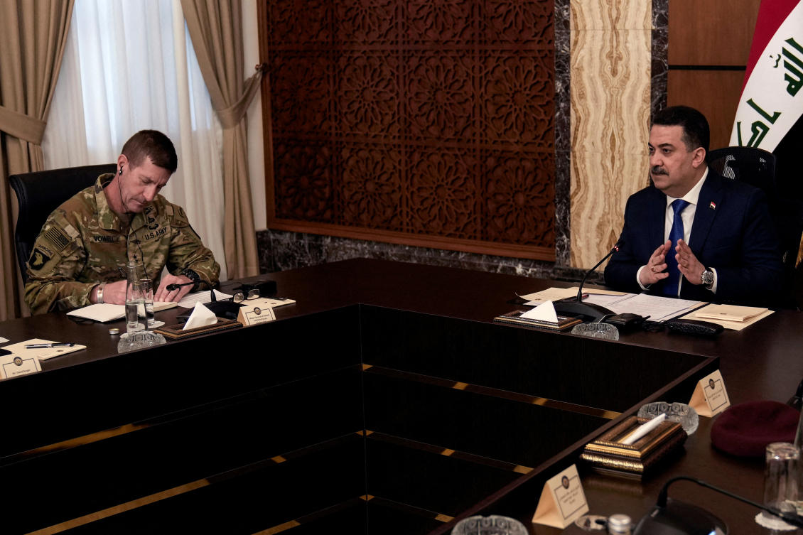 Iraqi Prime Minister Mohammed Shia Al-Sudani and Major General Joel “J.B.” Vowell attend the first session of negotiations between Iraq and the US to wind down the International Coalition mission in Baghdad, Iraq, on January 27, 2024. (Reuters/File Photo)