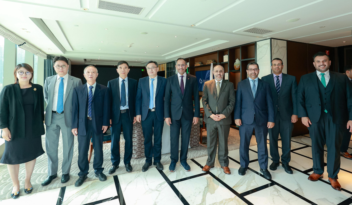 Bandar Alkhorayef pose for a group photo with representatives of Chinese mining companies. (Supplied)