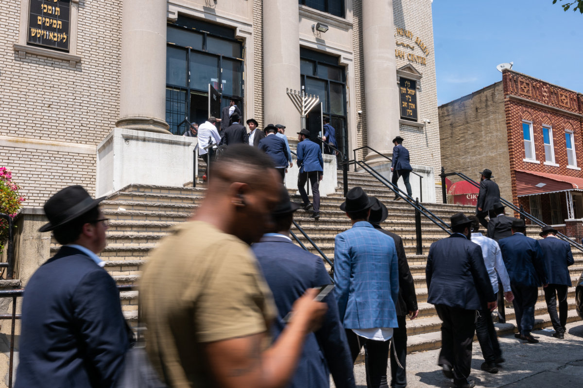 People are seen entering a Jewish center in Brooklyn, New York City, in this photo taken on June 5, 2024. Brooklyn is home to thousands of Hasidic and Orthodox Jews who follow numerous rabbis and branches of Judaism. (Getty Images/AFP)