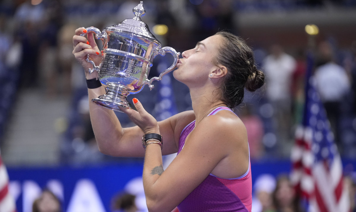 Aryna Sabalenka, of Belarus, kisses the trophy after winning the women's singles final of the U.S. Open tennis championships against Jessica Pegula, of the United States, , Saturday, Sept. 7, 2024, in New York. (AP)