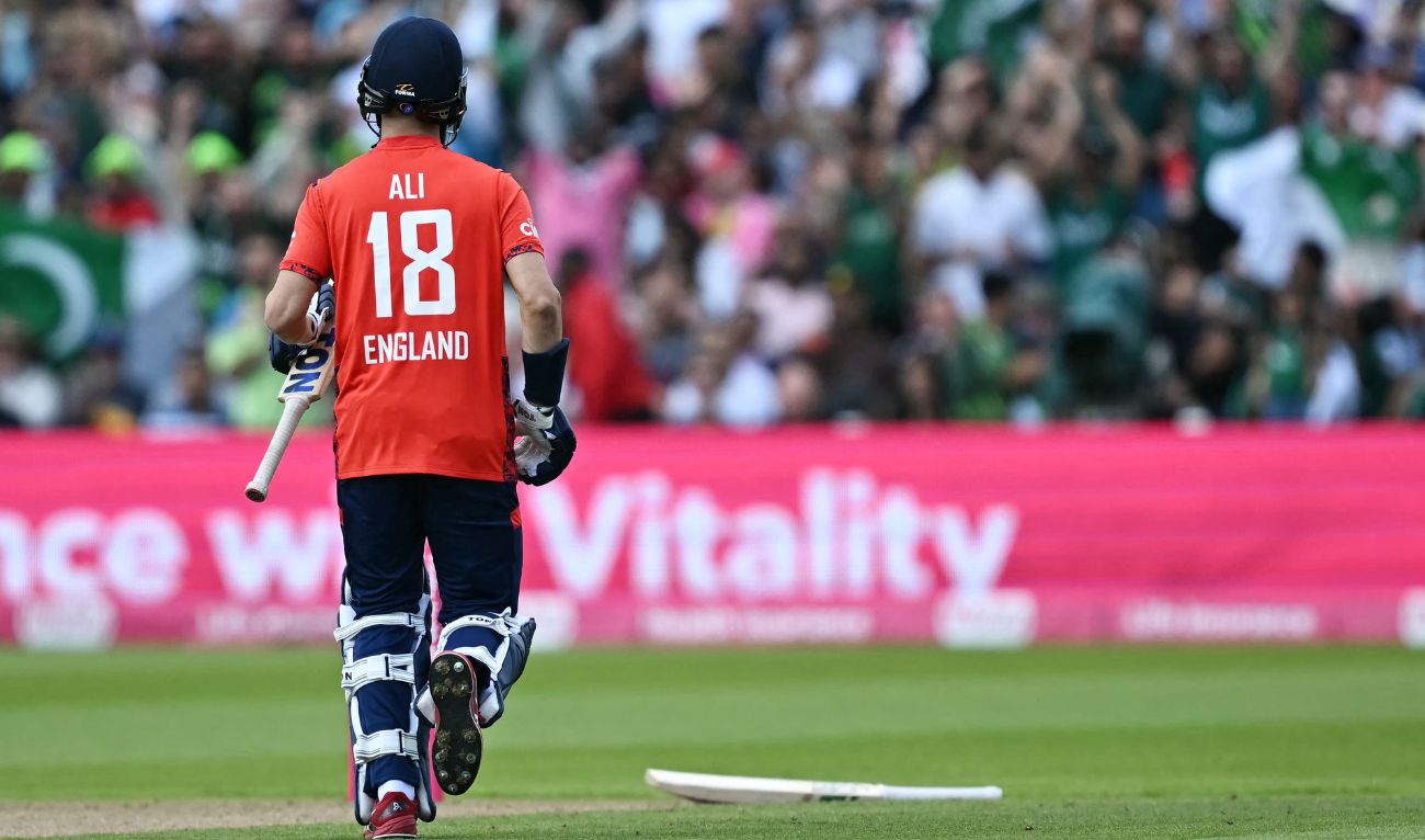 England's Moeen Ali collects England's Jos Buttler's bat after his dismissal during the second T20 international cricket match between England and Pakistan at Edgbaston, in Birmingham, central England, on May 25, 2024. (AFP/File)