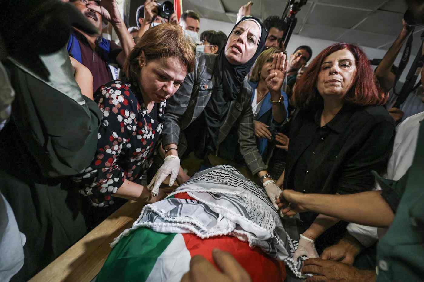 Activists mourn the body of slain Turkish-American activist Aysenur Ezgi Eygi at the Rafidia hospital morgue in Nablus, occupied West Bank on September 8, 2024. (AFP)