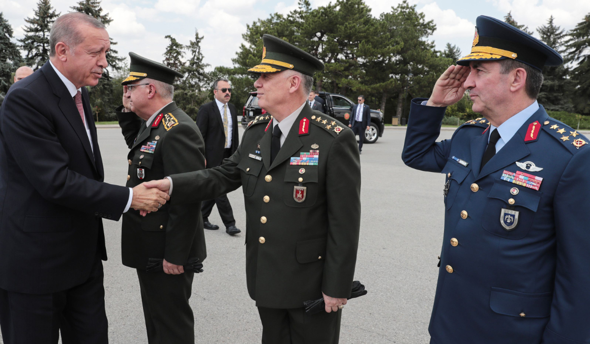 Turkish President Recep Tayyip Erdogan (L) shaking hands with members of the Supreme Military Council during a visit of Anitkabir, the mausoleum of Mustafa Kemal Ataturk, founder of modern Turkey before their meeting in Ankara. (AFP file photo)