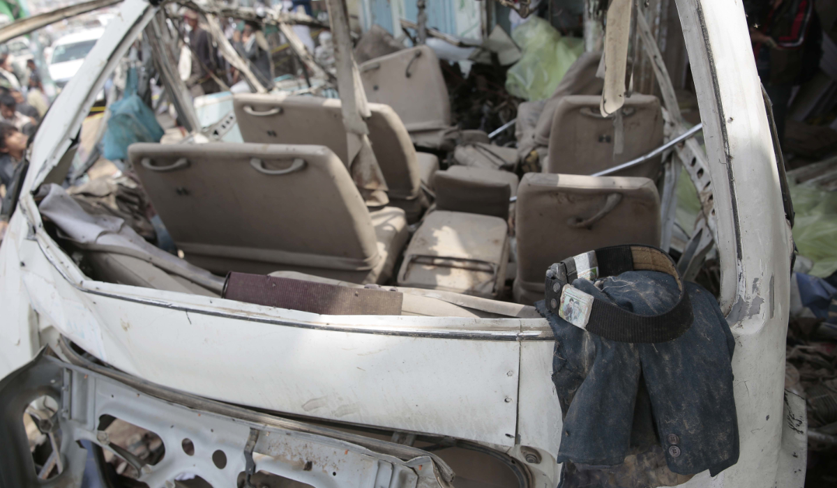 The clothes of a victam lies on the wreckage of a bus at the site of an airstrike in Saada, Yemen, Sunday, Aug. 12, 2018. (AP file photo)