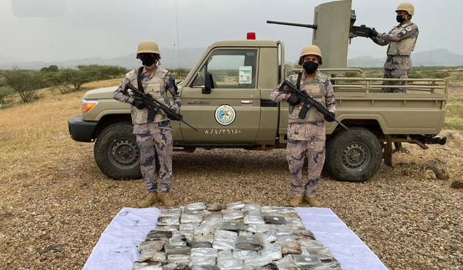 A Saudi Border Guard patrol displays illegal drugs it had confiscated from drug traffickers for inspection. (SPA file photo)