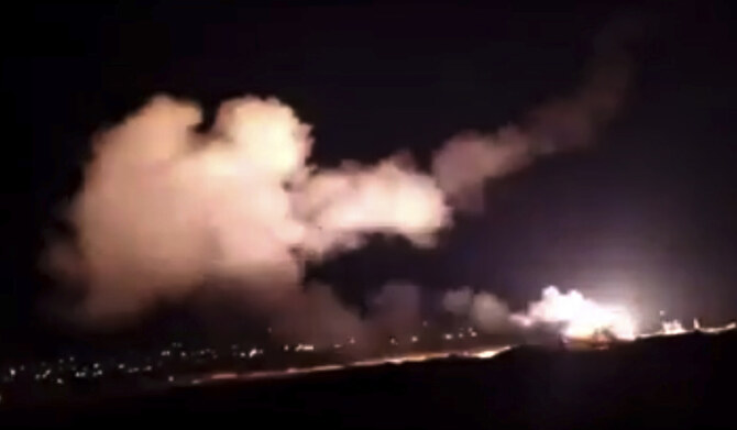 This frame grab from a video provided by the Syrian official news agency SANA shows missiles flying into the sky near Damascus, Syria, Tuesday, Dec. 25, 2018. (AFP)