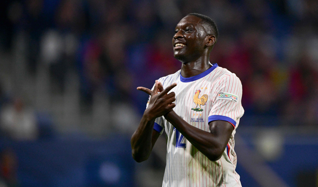 France's forward #12 Randal Kolo Muani celebrates after scoring France's first goal during the UEFA Nations League, League A - Group 2 first leg football match between France and Belgium at the Parc Olympique Lyonnais in Lyon on September 9, 2024. (AFP)