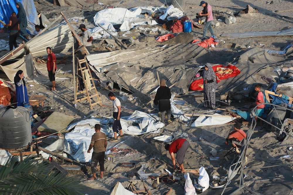 Israeli forces targeted unarmed civilians in a series of attacks on Tuesday, leaving 40 dead. (AFP)