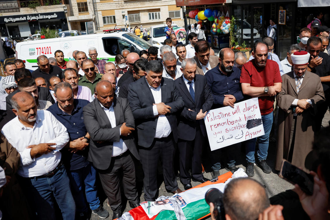 Palestinians pray during a procession honoring Turkish-American activist Aysenur Ezgi Eygi, who was shot dead by Israeli forces in Nablus, in the Israeli-occupied West Bank Sept. 9, 2024. (Reuters)