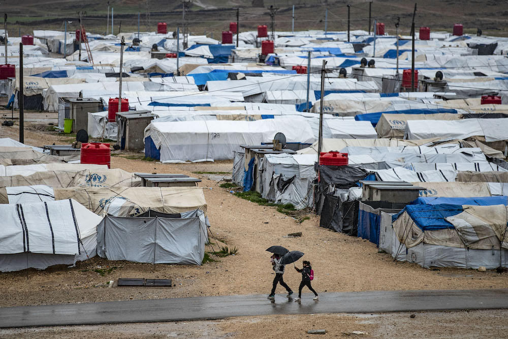 Above, Camp Roj, where relatives of people suspected of belonging to Daesh group are held, Al-Malikiyah in Syria’s northeastern Hasakah province. About 170 women had returned from Iraq and Syria to France, including 57 from detention camps in northeast Syria in recent years. (AFP file photo)