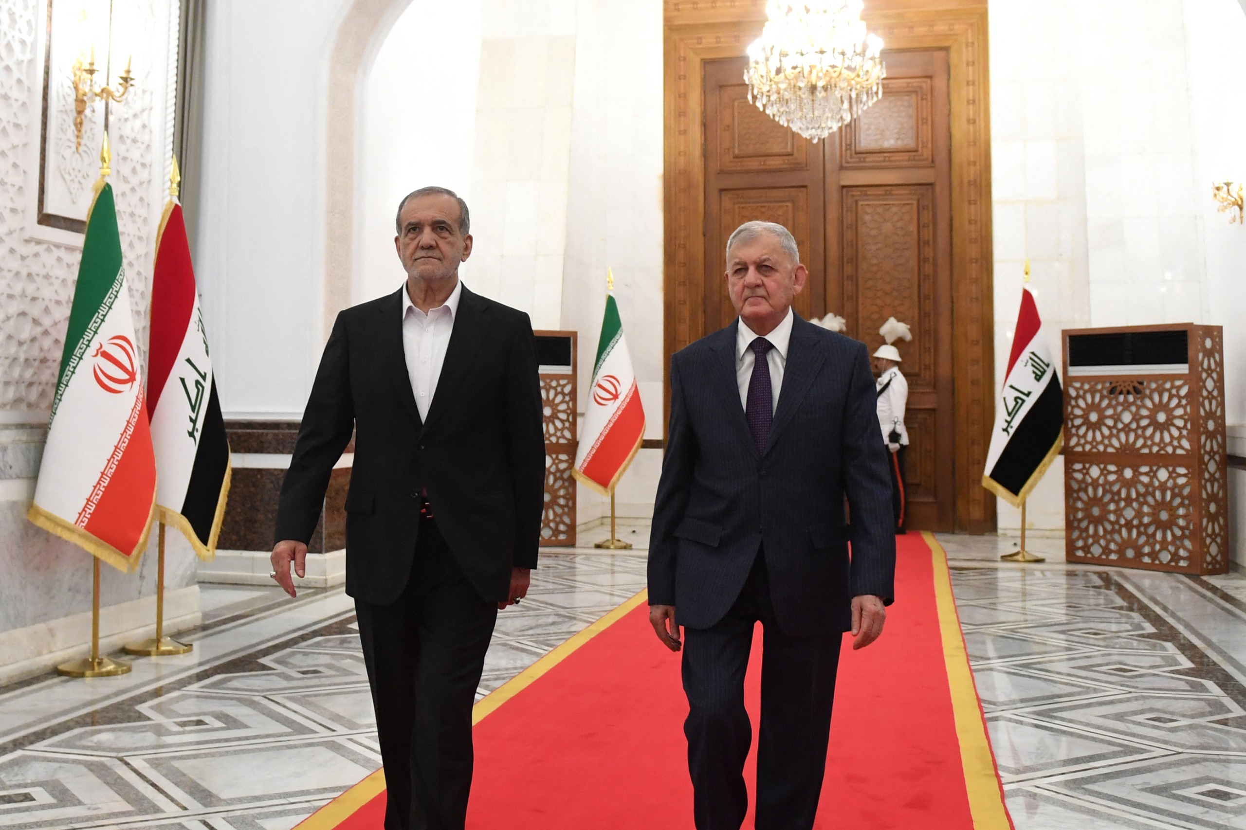 Iraqi President Abdul Latif Rashid meets with Iranian President Masoud Pezeshkian in Baghdad, Iraq September 11, 2024. (Reuters)