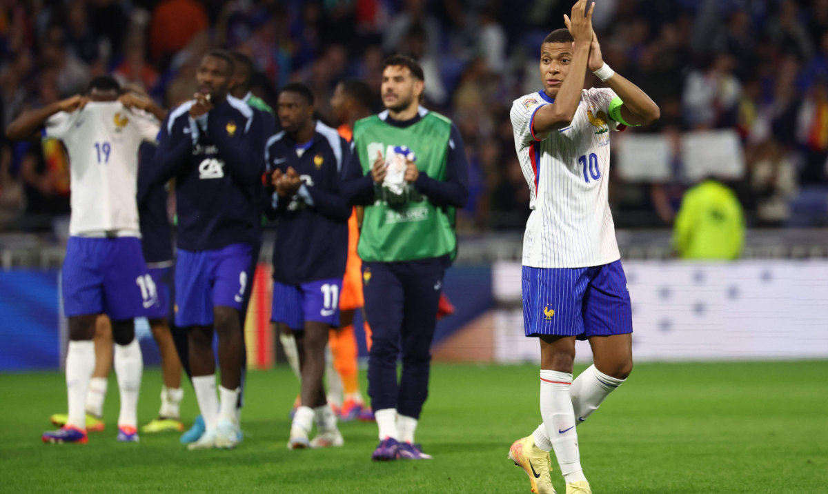 France's forward #10 Kylian Mbappe (R) acknowledges the supporters at the end of the UEFA Nations League, League A - Group 2 first leg football match between France and Belgium at the Parc Olympique Lyonnais in Lyon on Sept. 9, 2024. (AFP)