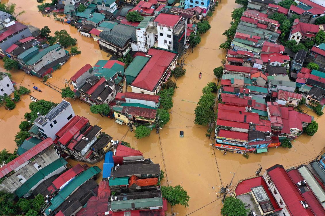 This aerial picture shows flooded streets in Yen Bai on September 10, 2024, in the aftermath of Typhoon Yagi hitting northern Vietnam. More than 59,000 people have been forced to evacuate their homes in the flood-hit province of Yen Bai in northern Vietnam, local authorities said September 10. (AFP)