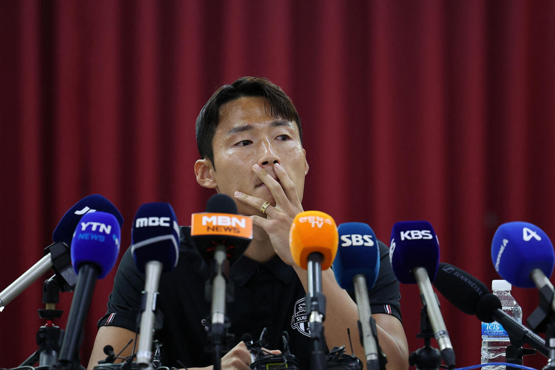 South Korean soccer player Son Jun-ho, who was detained and released in China before returning home this year, reacts during a news conference after China’s football association banned him for life following a two-year investigation into match-fixing and gambling. (REUTERS)