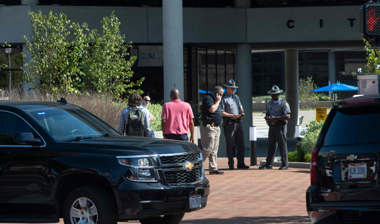 Police officers stand outside the Springfield City Hall after bomb threats were made against buildings earlier in the day in Springfield, Ohio on September 12, 2024. (AFP)