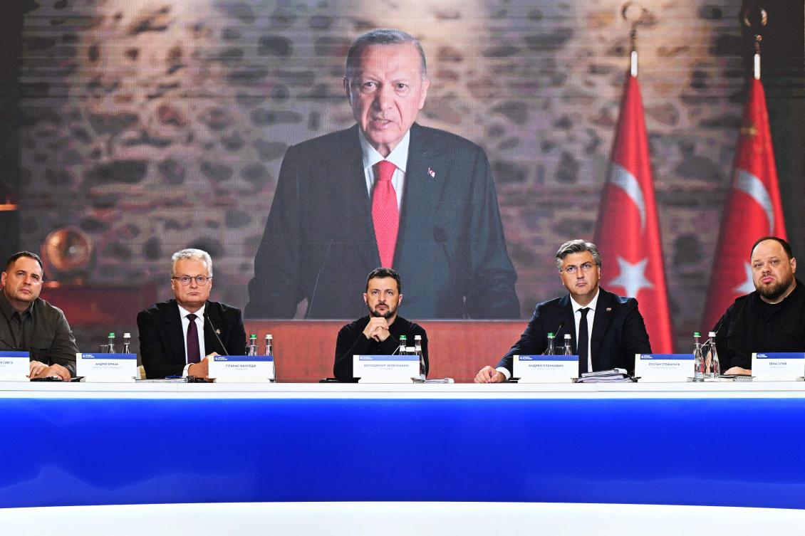 Ukrainian President Volodymyr Zelensky (C) Lithuanian President Gitanas Nauseda (2nd L) and Croatian President look on as Turkish President Recep Tayyip Erdogan calls in via video, during the Fourth Crimea Platform Leaders Summit in Kyiv, on September 11, 2024, amid the Russian invasion on Ukraine. (AFP)