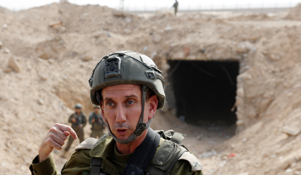 IDF spokesperson Rear Admiral Daniel Hagari speaks at the entrance to a tunnel leading to Egypt amid the ongoing conflict between Israel and the Palestinian Islamist group Hamas in the Gaza Strip, in the Philadelphi Corridor area in southern Gaza, September 13, 2024. (REUTERS)