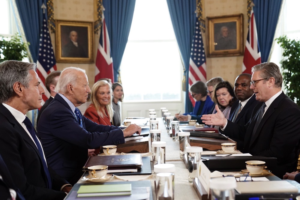 Britain's Prime Minister Keir Starmer, right, and Foreign Secretary David Lammy, second right, during a meeting with US President Joe Biden, centre left, in the Blue Room at the White House in Washington, Friday Sept. 13, 2024. (AP)