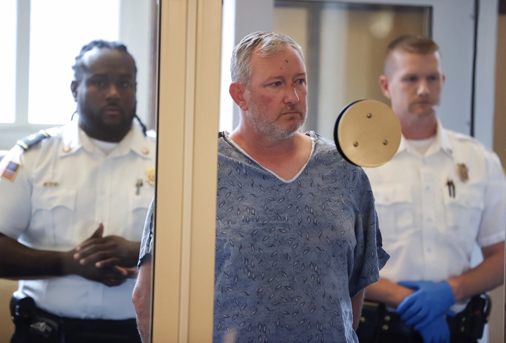 Scott Hayes, arrested on charges of assault and battery with a dangerous weapon and violation of a constitutional right causing injury at a pro-Israel rally, appears for his arraignment in Newton District Court, Friday, Sept. 13,2024, in Newton, Mass. (The Boston Globe/AP)