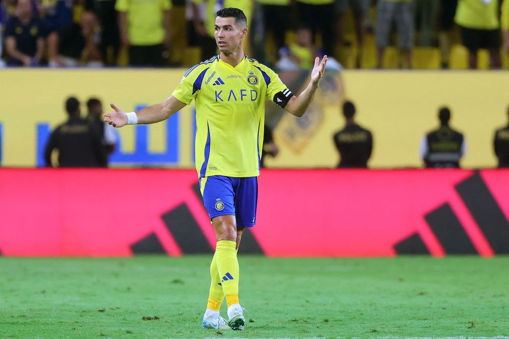 Al-Nassr’s Portuguese forward Cristiano Ronaldo gestures during the Saudi Pro League football match between Al-Ahli and Al-Nassr at at Al-Awwal Stadium in Riyadh on Sept. 13, 2024. (AFP)