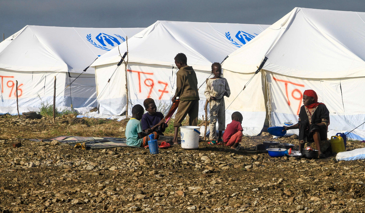 Displaced Sudanese who have returned from Ethiopia gather in a camp run by the United Nations Refugee Agency (UNHCR) in Sudan's border town of Gallabat in the eastern state of Gadaref on September 11, 2024. (AFP)