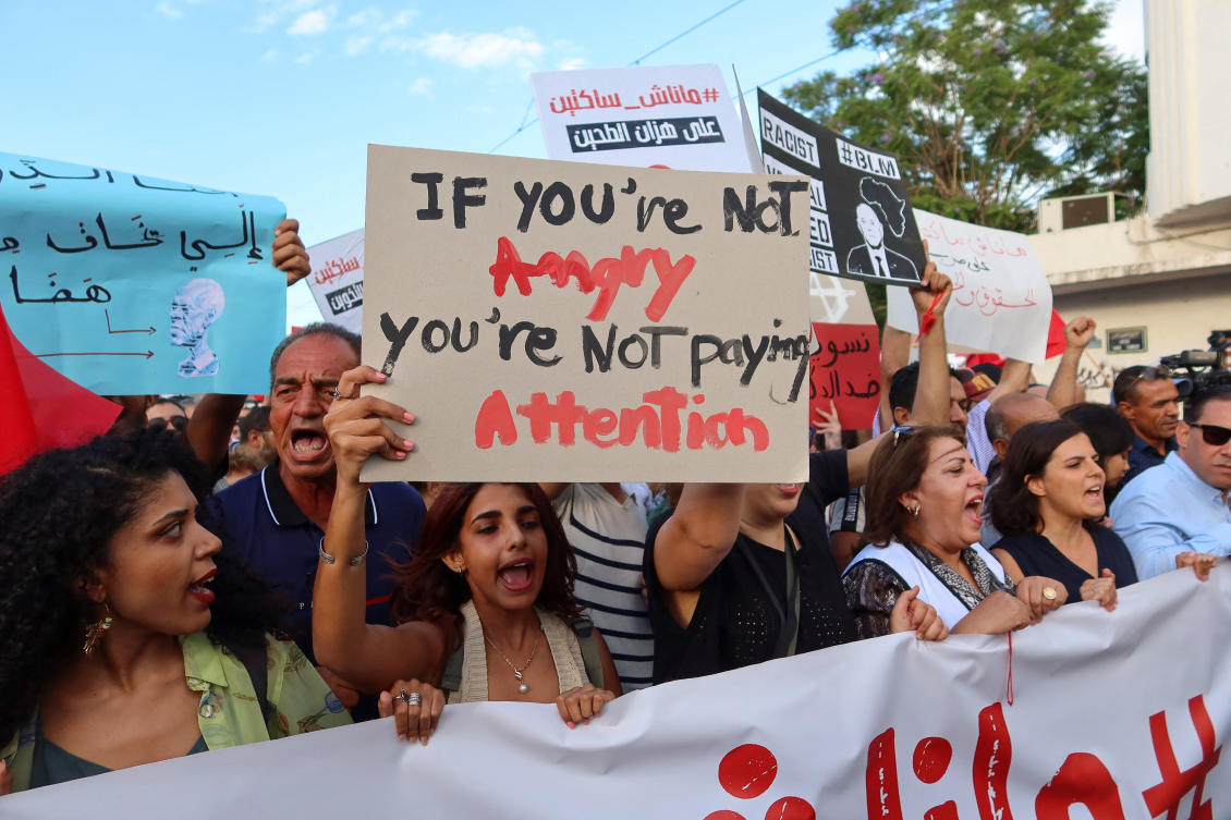 Demonstrators hold signs and chant slogans during a protest against Tunisia President Kais Saied, whom they accuse of trying to rig the October 6 presidential election by detaining and intimidating his rivals, in Tunis, Tunisia, September 13, 2024. (Reuters)