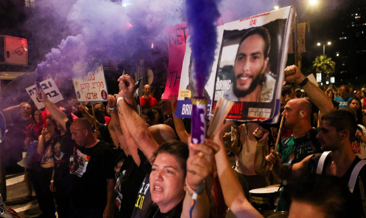 People march through streets as they attend a protest against the government and to show support for the hostages who were kidnapped during the deadly October 7 attack, amid the ongoing conflict in Gaza between Israel and Hamas, in Tel Aviv, Israel September 14, 2024. (Reuters)