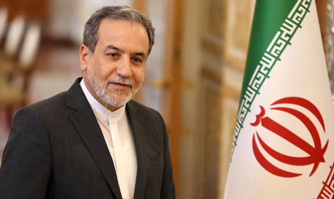 Iran's new foreign minister, Abbas Araghchi, waits for the arrival of his Qatari counterpart before their meeting in Tehran on August 26, 2024. (AFP)