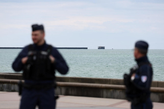 Police members work in Wimereux, near Calais, after migrants died in an attempt to cross the English Channel, in France. (File/Reuters)