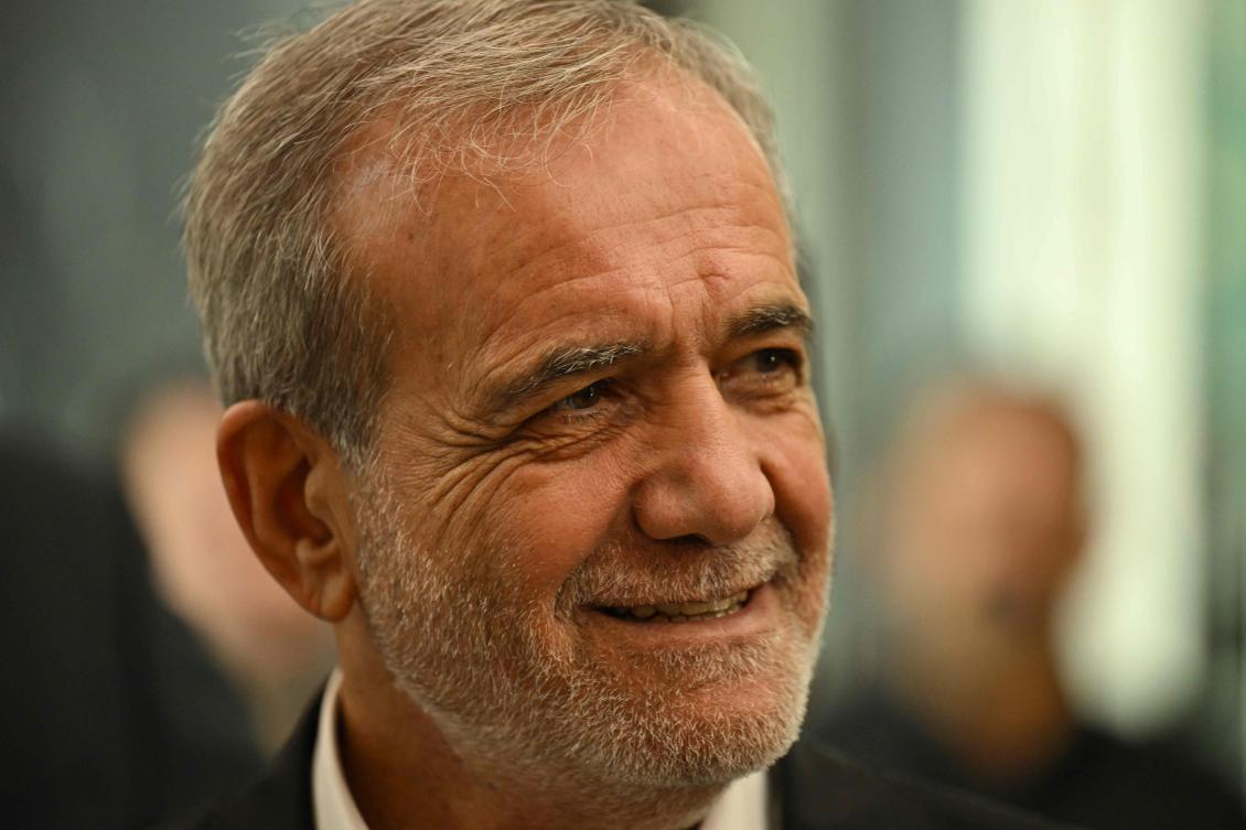 Iran's President Masoud Pezeshkian makes his way to his plane after his visit to the Iraqi city of Basra on September 13, 2024. (File/AFP)