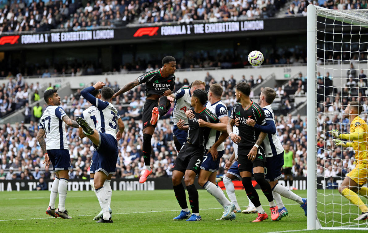 Arsenal’s Gabriel Magalhaes scores their first goal against Tottenham Hotspur in the north London derby. (Reuters)