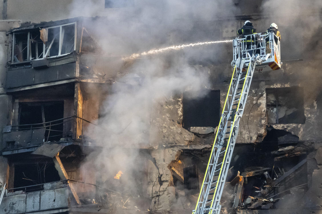 Firefighters tackle a blaze after a Russian aerial bomb struck a multi-story residential building in Kharkiv, Ukraine, Sunday Sept. 15, 2024. (AP)