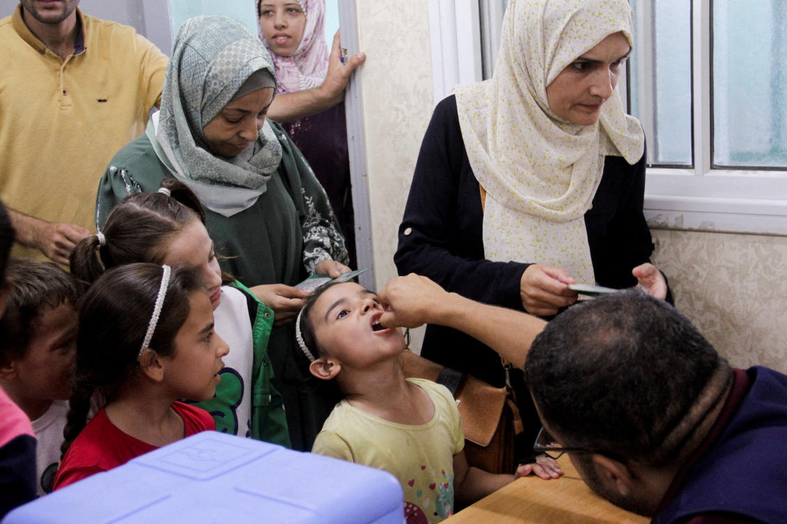 Palestinian child is vaccinated against polio, amid the Israel-Hamas conflict, in Jabalia in northern Gaza Strip. (File/Reuters)