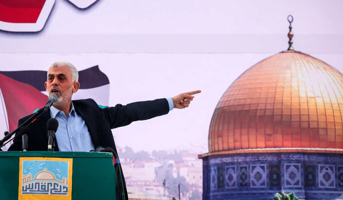 Yahia al-Sinwar (C), the Gaza Strip chief of the Palestinian Islamist Hamas movement, addresses supporters during a rally marking Al-Quds (Jerusalem) Day, a commemoration in support of the Palestinian people celebrated annually on the last Friday of the Muslim fasting month of Ramadan, in Gaza City, on April 14, 2023. (AFP)
