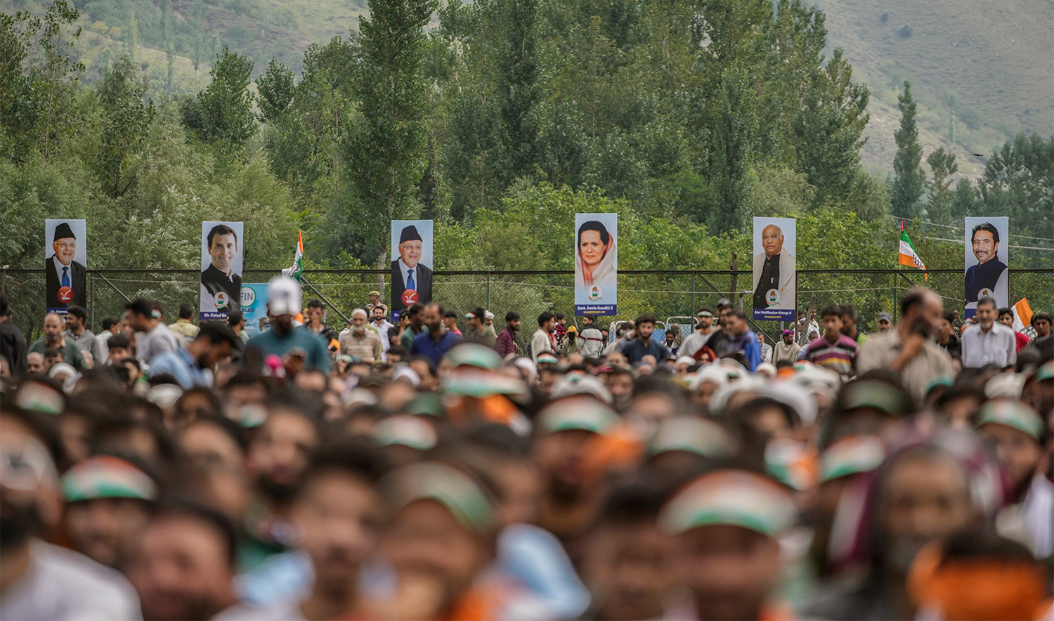 Supporters listen as India's opposition Congress party leader Rahul Gandhi, unseen, speaks during an election rally at Dooru some 78 kilometers south of Srinagar, Indian controlled Kashmir, on September 4, 2024. (AP/File)