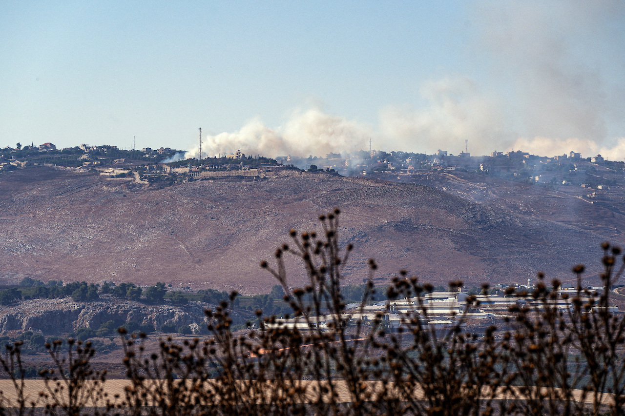Smoke rises above Lebanon following an Israeli strike, amid the ongoing cross-border hostilities between Hezbollah and Israeli forces, as seen from Israel's border with Lebanon in northern Israel, September 8, 2024. (Reuters)